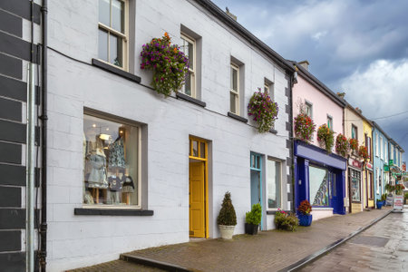 Street with bright houses in Adare, County Limerick, Irelandの写真素材