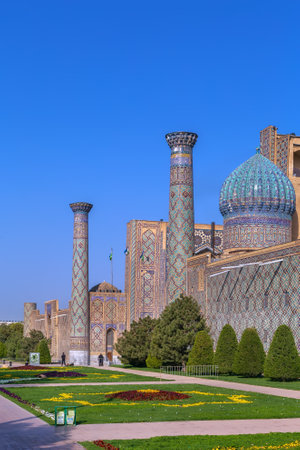 View of Sher-Dor Madrasa from park, Samarkand, Uzbekistanの写真素材