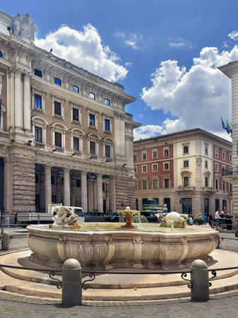 Fountain in the Piazza Colonna in Rome city center, Italyの写真素材