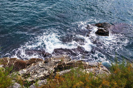Rocky coast of the Ligurian Sea, Genoa, Italy. View from Anita Garibaldi Promenadeの写真素材