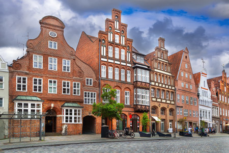 Historical houses on Am Sande Square in Luneburg, Germanyの写真素材