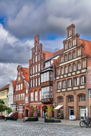 Historical houses on Am Sande Square in Luneburg, Germanyの写真素材