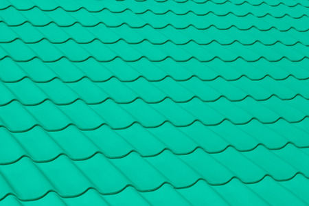 the texture of green roof tilesの写真素材