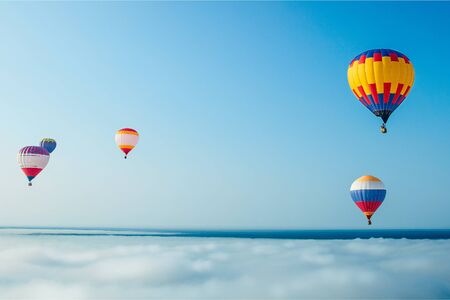 balloons on the blue sky backgroundの写真素材