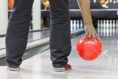 the hand throws the bowling ballの写真素材