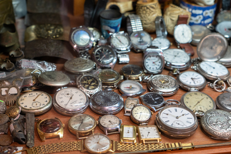 vintage pocket and wrist watches are on the shelfのeditorial素材