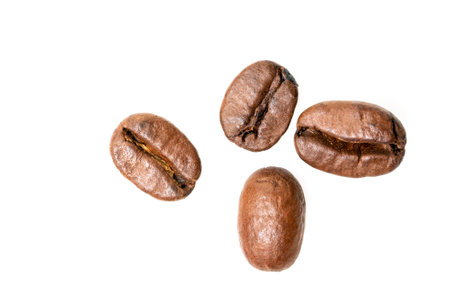 Coffee beans isolated on white background close upの写真素材