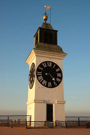 photo of beautiful clock tower at suny dayの写真素材