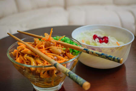 Sauerkraut and marinated mushrooms for a snackの写真素材