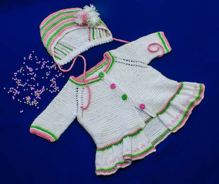 Knitted children's clothesの写真素材