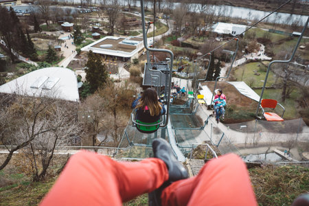 Scenic Aerial Cable Ride Offering Panoramic Views of Serene Parkland and River on an Adventurous Day...