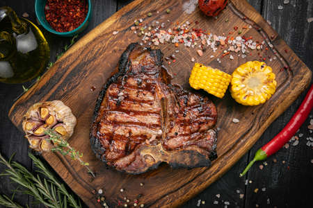 Barbecue dry aged Steak sliced T-bone steakの写真素材