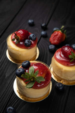 dessert with strawberries on a black backgroundの写真素材