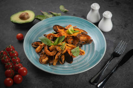 Seafood salad on a dark background