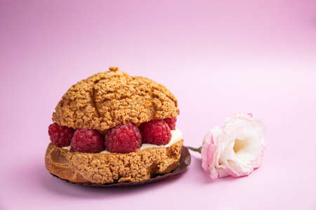 Fragrant French pastries, dessert. On the pink table.の写真素材