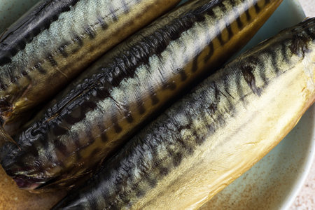 smoked mackerel on a plate, close-up, macro