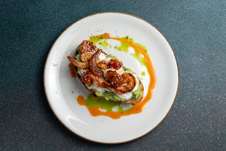 salmon tartare with avocado and fried shrimp - fusion food styleの写真素材