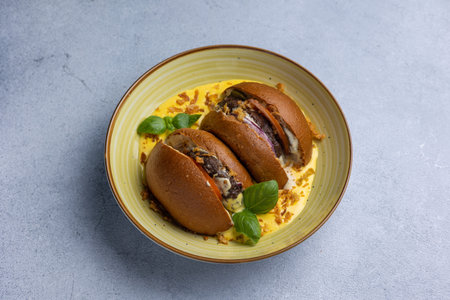Homemade hamburgers with cheese and herbs