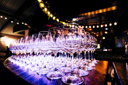 Luxury table settings for fine dining with and glassware, beautiful blurred background.の写真素材