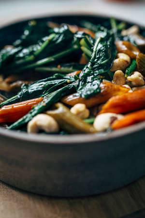 gourmet vegan food prepared and served. Only healthy Ingredients like Kale ginger, garlic.の写真素材