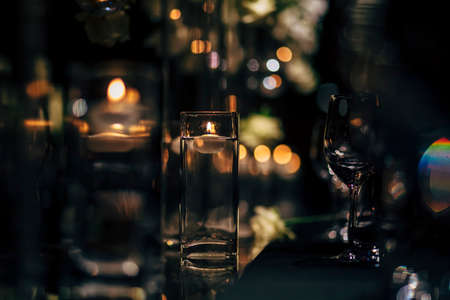 Luxury table settings for fine dining with and glassware, beautiful blurred  background. For events, weddings and other social events.の写真素材