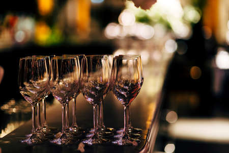 Luxury table settings for fine dining with and glassware, beautiful blurred  background. For events, weddings.の写真素材