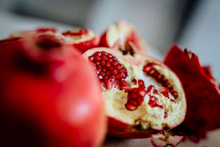 Fresh POMEGRANATE on wooden background.の写真素材