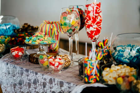 Luxury table settings for fine dining with and glassware, beautiful blurred  background. For events, weddings.  Preparation for holiday  Christmas and Hanukkah dinner night. props for weddings, birthdays, and celebrations.の写真素材