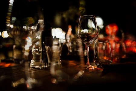 Luxury table settings for fine dining with and glassware, beautiful blurred  background.の写真素材