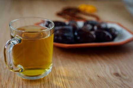 Elegant and Beautiful settings for ramadan holidays in islamic culture  Ramadan also known as Ramzan Ramadhan Ramathan with herb tea and Prayer beads.の写真素材