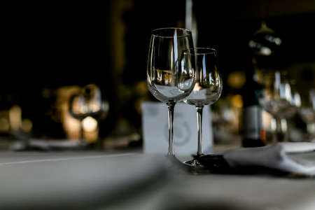 Beutiful setup of wine glasess for dinner, party, weddings or chrismasの写真素材