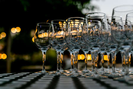 Beutiful setup of wine glasess for dinner, party, weddings or chrismasの写真素材