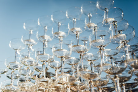 Wine glasses on a blue background. Glasses for champagne.の写真素材