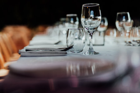 Wine glasses on a table in a restaurant. Selective focus.の写真素材