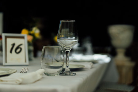 Wine glasses on a table in a restaurant. Selective focus.の写真素材