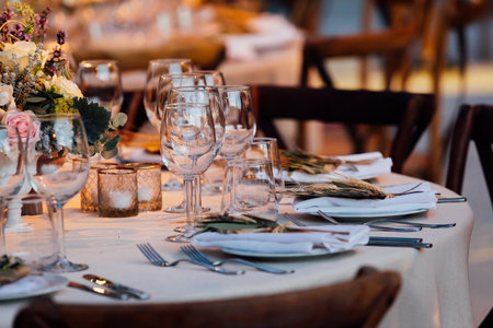 Table set for an event party or wedding reception in a restaurant.の写真素材