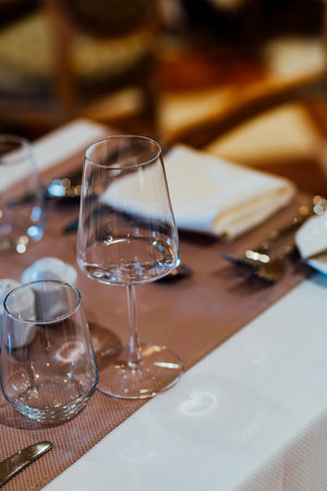 Luxury table settings for fine dining in romantic LUXURY Restaurant.  For events, weddings and celebration.の写真素材