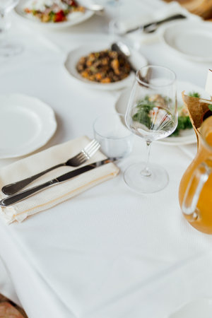 Luxury table settings for fine dining in romantic LUXURY Restaurant.  For events, weddings and celebration.の写真素材