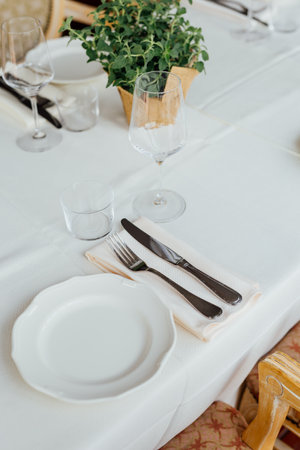 Luxury table settings for fine dining in romantic LUXURY Restaurant.  For events, weddings and...