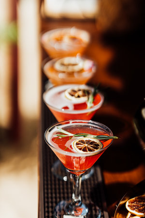 cocktail and wine at social events like party and weddings. served by bartender and waiter. evening....