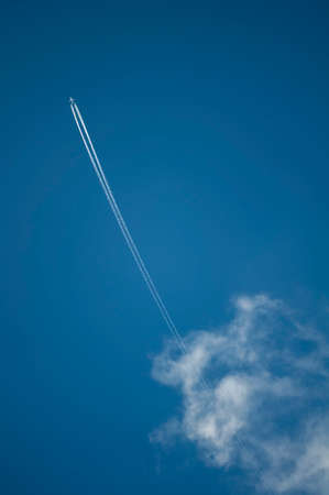 Trace of the plane in the blue sky