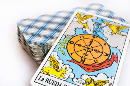 the deck of Tarot cards on white background, top down card the fortuneの写真素材