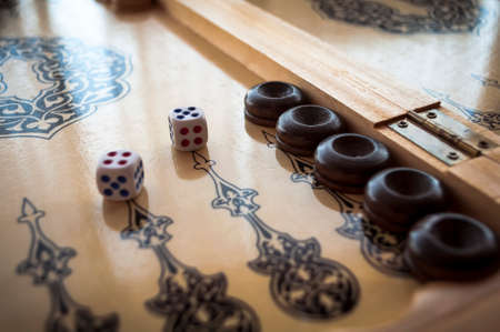 vintage wooden backgammon pattern and the diceの写真素材