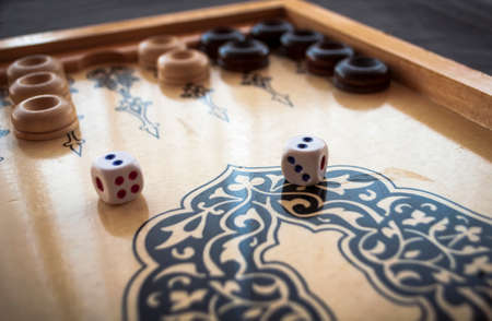 vintage wooden backgammon pattern and the diceの写真素材