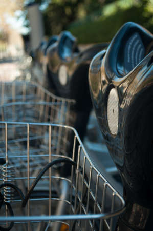 Bicycle Parking,the wheel and part of the basket closeupの写真素材
