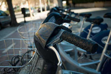 Bicycle Parking,the wheel and part of the basket closeupの写真素材