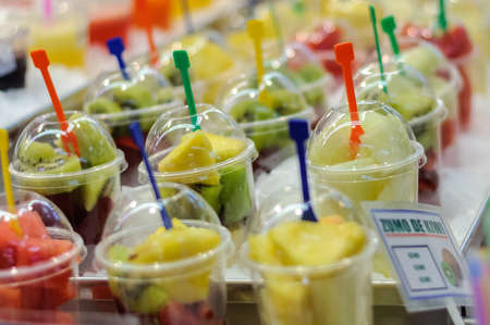 on the market freshly squeezed fruit juicesの写真素材