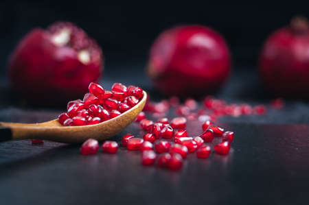 fresh pomegranate on a black backgroundの写真素材