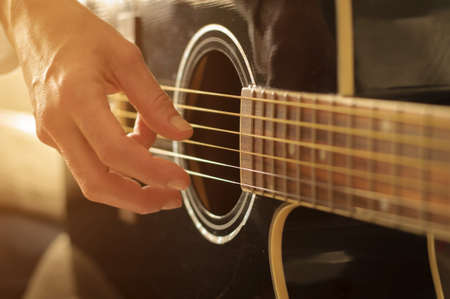 playing acoustic guitarの写真素材