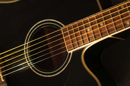 black acoustic guitarの写真素材